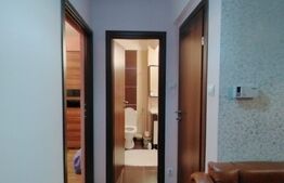 Apartament spatios , 56 mp , zona Eroilor , 2 balcoane , garaj subteran .