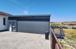 Casă desfășurată pe un singur nivel de 107 mp, cu 500 mp teren, în Corușu