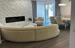 Apartament 2 camere, ultrafinisat, mobilat si utilta, 40 mp gradina si parcare