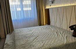 Apartament 2 camere, ultrafinisat, mobilat si utilta, 40 mp gradina si parcare
