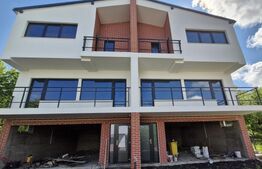 Duplex semifinisat cu teren si garaj, intr-o zona linistita aproape de oras