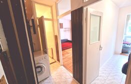 Garsonieră decomandată–zona Tractorul, 30,3 mp, etaj 3/4 + loc de parcare