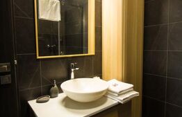 Apartament modern, zona centrala, cu parcare. Ocupabil de la 1 ianuarie 