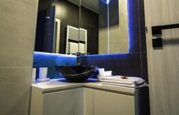 Apartament modern, zona centrala, cu parcare. Ocupabil de la 1 ianuarie 