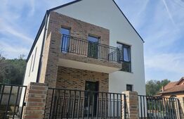 Casa luminoasa de 120 mp, cu living generos, materiale premium si curte proprie