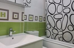 Apartament complet amenajat-2 camere, decomandat, curte privată – gata de locuit