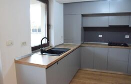 Apartament cu 5 camere, 3 băi, curte situat în vilă, zona Tractorul