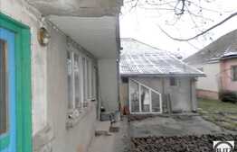 Vanzare casa, 80 mp utili, teren 790 mp, cu front de 14 ml, intr-o zona de case