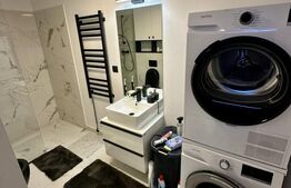 Apartament de lux, 58 mp utili si 52 mp gradina, zona semicentrala