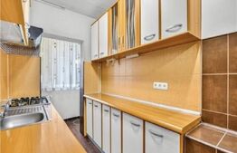Apartament 2 camere, renovat, 2 balcoane, boxă și parcare – Tractorul