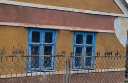 Casa cu doua corpuri