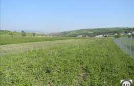 Vanzare teren 1100 mp, front stradal 20 ml, zona linistita de case/vile