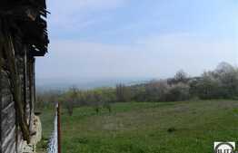 Teren de vanzare 1100 mp, front 25 ml, cu priveliste deosebita, POT 35 % CUT 0.9