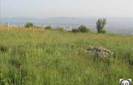 Vanzare teren 704 mp, front stradal 32 ml,  zona linistita de case si vile