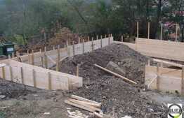 Vanzare teren 630 mp, cu front 19 ml, constructie inceputa P+E, 138 mp utili