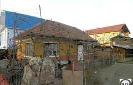 Teren de vanzare 400 mp, front 21 ml, cu casa demolabila, zona linistita