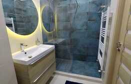 Apartament cu nisa de dormit si living lux, garaj, zona Sub Cetate!