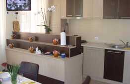 Apartament modern, sistem de alarma, gradina de 25 mp, 2 locuri de parcare!