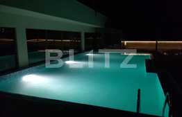Apartament cu 2 camere, 75 mp, piscina, terasa de 70 mp, zona American Village