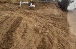 Teren intravilan, drum asfaltat, zona Tauti