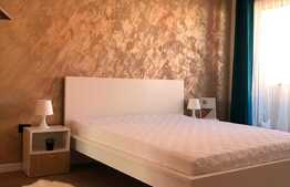 Apartament de lux cu 2 dormitoare, balcon 10 mp, parcare, zona centrala