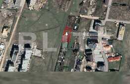 Teren intravilan de 1094 mp, Tractorul