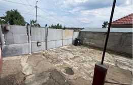 Casă cu 2 camere curte spațioasă și grădină îngrijită