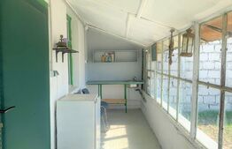 Teren intravilan ingradit, 3869 mp, livada, 2 magazii si birou, sat Horia