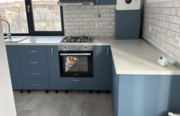 Prima închiriere: Apartament ultrafinisat cu 2 camere, parcare privată, zonă centrală