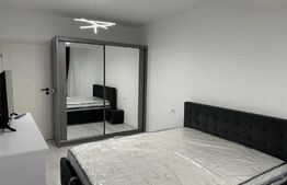 Prima închiriere: Apartament ultrafinisat cu 2 camere, parcare privată, zonă centrală