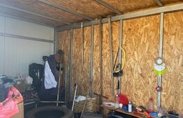 Teren intravilan de 430mp cu construcție metalică situat în zona Ghercești/Gârlești