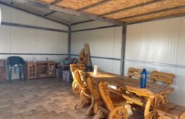 Teren intravilan de 430mp cu construcție metalică situat în zona Ghercești/Gârlești