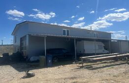 Teren 5000 mp cu hala de 280 mp in Isalnita, cu deschidere la E79