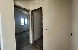 Casa pe parter cu un design deosebit, zona nordica / Simnicul de Jos