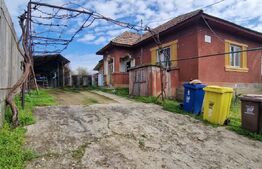 Casa modesta, 651 mp teren, zona Romanesti