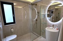 Apartament de lux,2 camere,2 băi,bloc nou,parter +parcare privată