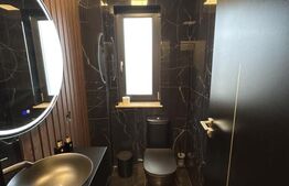 Apartament de lux,2 camere,2 băi,bloc nou,parter +parcare privată