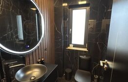 Apartament de lux,2 camere,2 băi,bloc nou,parter +parcare privată