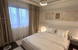Apartament de lux,2 camere,2 băi,bloc nou,parter +parcare privată