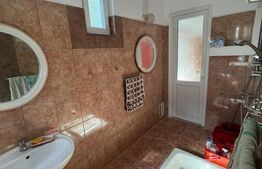 Casă spațioasă cu 6 camere, teren 700 mp, garaj și terasă
