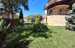 Proprietate elegantă cu teren mare și garaj în Bucium, perfectă pentru familie