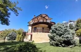 Proprietate elegantă cu teren mare și garaj în Bucium, perfectă pentru familie