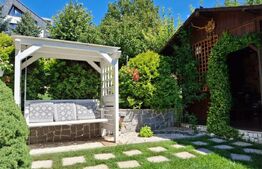 Proprietate elegantă cu teren mare și garaj în Bucium, perfectă pentru familie