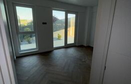 Apartament 2 camere, 58 mp, 115 mp gradina, loc de parcare