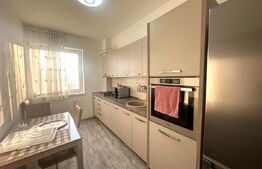 Apartament călduros de închiriat, cu 2 camere, 54 mp, Bloc Prima
