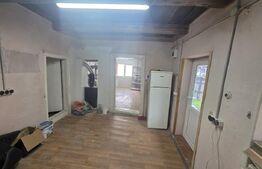 Casă țărănească în centrul localității Ilieni – teren 832 mp.