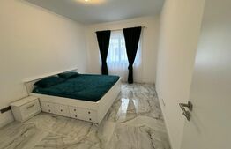 Apartament  cu o camera + curte, balcon loc de parcare boxa 