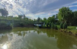 Teren intravilan 60 ari cu iaz si cabana, zona Ilisesti