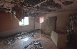 Casă cu acoperisul ars cu teren intravilan, 764 mp, zona Răzvad 