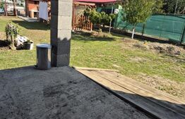 Casa in rosu cu 1500 mp teren 